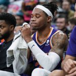 Phoenix Suns' Richaun Holmes reacts on the bench after fouling out during the second half of the team's NBA basketball game against the San Antonio Spurs, Tuesday, Jan. 29, 2019, in San Antonio. San Antonio won 126-124. (AP Photo/Darren Abate)