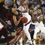 Oregon State guard Ethan Thompson, left, is fouled by Arizona State forward De'Quon Lake during the second half of an NCAA college basketball game Thursday, Jan. 17, 2019, in Tempe, Ariz. Arizona State won 70-67. (AP Photo/Ross D. Franklin)