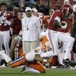Clemson's A.J. Terrell stops Alabama's Jerry Jeudy after a catch during the second half of the NCAA college football playoff championship game, Monday, Jan. 7, 2019, in Santa Clara, Calif. (AP Photo/David J. Phillip)