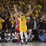 Arizona State guard Rob Edwards (2) celebrates a 3-pointer by Remy Martin, while standing near Arizona guard Alex Barcello (23), during overtime of an NCAA college basketball game Thursday, Jan. 31, 2019, in Tempe, Ariz. Arizona State won 95-88. (AP Photo/Ross D. Franklin)