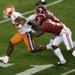 Clemson's Travis Etienne runs for a touchdown during the first half the NCAA college football playoff championship game against Alabama, Monday, Jan. 7, 2019, in Santa Clara, Calif. (AP Photo/Jeff Chiu)