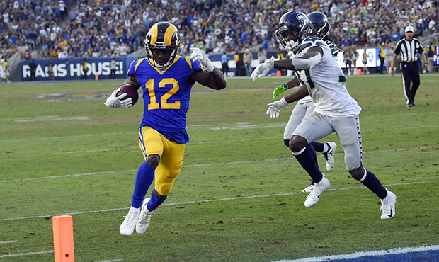 Los Angeles Rams wide receiver Brandin Cooks scores against the Seattle Seahawks during the second ...