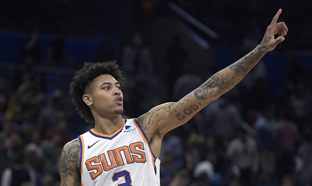 Phoenix Suns forward Kelly Oubre Jr. (3) celebrates the team's overtime win over the Orlando Magic ...