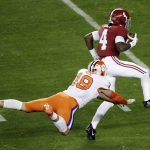 Alabama's Jerry Jeudy gets past Clemson's Tanner Muse for a touchdown during the first half the NCAA college football playoff championship game, Monday, Jan. 7, 2019, in Santa Clara, Calif. (AP Photo/Jeff Chiu)