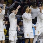 Arizona State players on the bench cheer on their team during the first half of an NCAA college basketball game against Oregon, Saturday, Jan. 19, 2019, in Tempe, Ariz. (AP Photo/Darryl Webb)