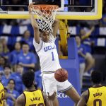 UCLA center Moses Brown (1) dunks against Arizona State during the first half of an NCAA college basketball game Thursday, Jan. 24, 2019, in Los Angeles. (AP Photo/Marcio Jose Sanchez)