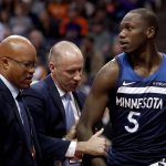 Minnesota Timberwolves center Gorgui Dieng (5) leaves the game after being ejected during the second half of an NBA basketball game against the Phoenix Suns, Tuesday, Jan. 22, 2019, in Phoenix. (AP Photo/Matt York)