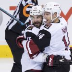 Arizona Coyotes' Brad Richardson, left, and Richard Panik, of Slovakia, celebrate Panik's goal against the Vancouver Canucks during the second period of an NHL hockey game Thursday, Jan. 10, 2019, in Vancouver, British Columbia. (Darryl Dyck/The Canadian Press via AP)