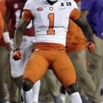 Clemson's Trayvon Mullen reacts after intercepting a pass during the first half the NCAA college football playoff championship game against Alabama, Monday, Jan. 7, 2019, in Santa Clara, Calif. (AP Photo/Chris Carlson)