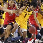 Arizona State guard Remy Martin (1) battles with Arizona forward Ira Lee (11) for the ball during the first half of an NCAA college basketball game Thursday, Jan. 31, 2019, in Tempe, Ariz. (AP Photo/Ross D. Franklin)