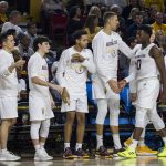 Arizona State's Luguentz Dort (0) is greeted by players on the bench as he come out of the game during the first half of an NCAA college basketball game against Oregon, Saturday, Jan. 19, 2019, in Tempe, Ariz. (AP Photo/Darryl Webb)