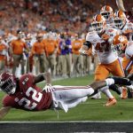 Alabama's Najee Harris reaches for the end zone during the first half the NCAA college football playoff championship game against Clemson, Monday, Jan. 7, 2019, in Santa Clara, Calif. (AP Photo/David J. Phillip)