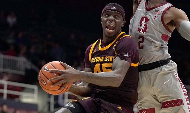 Arizona State forward Zylan Cheatham (45) is fouled by Stanford guard Bryce Wills (2) during the se...
