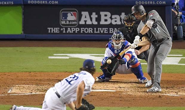 Arizona Diamondbacks' A.J. Pollock hits a home run off Los Angeles Dodgers starting pitcher Clayton...