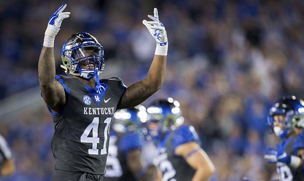 In this Sept. 29, 2018, file photo, Kentucky linebacker Josh Allen (41) rallies fans during the sec...