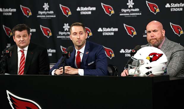 The Arizona Cardinals introduce their new head coach Kliff Kingsbury, middle, flanked by owner Mich...