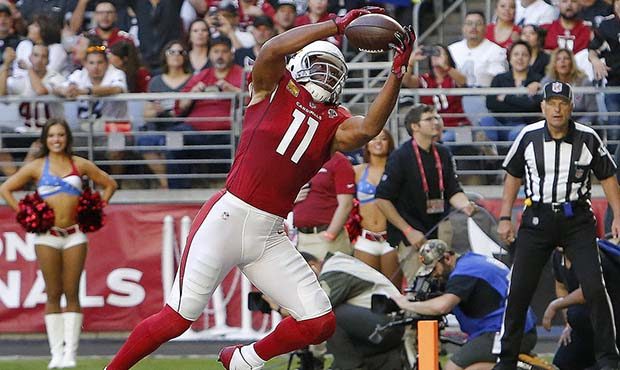 FILE - In this Nov. 18, 2018, Arizona Cardinals wide receiver Larry Fitzgerald (11) pulls in a touc...
