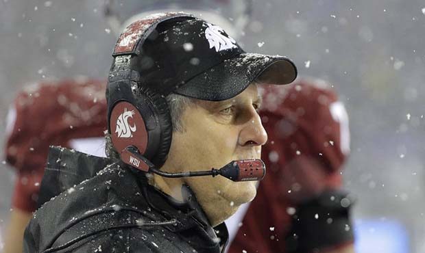 Washington State head coach Mike Leach watches from the sideline during the second half of an NCAA ...