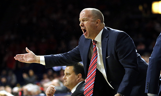Arizona Assistant Coach Mark Phelps in the first half during an NCAA college basketball game agains...