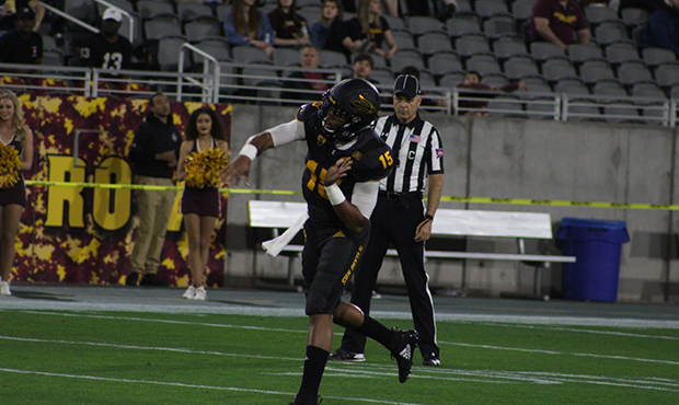 ASU quarterback Dillon Sterling-Cole throws a pass during the Maroon and Gold scrimmage on Thursday...