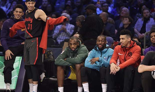 Portland Trail Blazers Seth Curry watches players shoot during the NBA All-Star 3-Point contest, Sa...