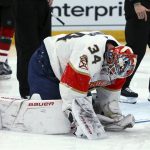 An injured Florida Panthers goaltender James Reimer pauses on the ice during the second period of the team's NHL hockey game against the Arizona Coyotes on Tuesday, Feb. 26, 2019, in Glendale, Ariz. Reimer left the game. (AP Photo/Ross D. Franklin)