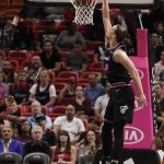 Miami Heat forward Kelly Olynyk (9) dunks the ball during the first half of an NBA basketball game against the Phoenix Suns on Monday, Feb. 25, 2019, in Miami. (AP Photo/Brynn Anderson)