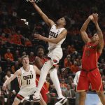 Oregon State's Stephen Thompson Jr. (1) drives to the basket past Arizona's Ira Lee, right, as Oregon State's Zach Reichle, left, and Arizona's Devonaire Doutrive (1) watch during the second half of an NCAA college basketball game in Corvallis, Ore., Thursday, Feb. 28, 2019. Arizona won 74-72. (AP Photo/Amanda Loman)