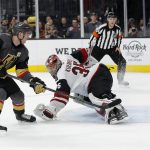 Vegas Golden Knights right wing Reilly Smith (19) misses a penalty shot against Arizona Coyotes goaltender Darcy Kuemper (35) during the second period of an NHL hockey game Tuesday, Feb. 12, 2019, in Las Vegas. (AP Photo/John Locher)
