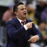Arizona head coach Sean Miller directs his team against Colorado in the first half of an NCAA college basketball game Sunday, Feb. 17, 2019, in Boulder, Colo. (AP Photo/David Zalubowski)