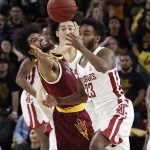 Arizona State guard Remy Martin and Washington State guard Ahmed Ali (23) battle for the ball during the first half of an NCAA college basketball game, Thursday, Feb. 7, 2019, in Tempe, Ariz. (AP Photo/Matt York)