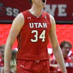 Utah center Jayce Johnson (34) celebrates a play during the second half of an NCAA college basketball game against Arizona, Thursday, Feb. 14, 2019, in Salt Lake City. (AP Photo/Alex Goodlett)