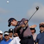 Webb Simpson hits from the 10th tee during the second round of the Phoenix Open PGA golf tournament, Friday, Feb. 1, 2019, in Scottsdale, Ariz. (AP Photo/Matt York)