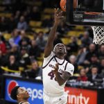 Arizona State forward Zylan Cheatham, right, goes up for basket past Colorado guard Tyler Bey in the first half of an NCAA college basketball game Wednesday, Feb. 13, 2019, in Boulder, Colo. (AP Photo/David Zalubowski)