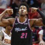 Miami Heat center Hassan Whiteside (21) celebrates after scoring during the first half of an NBA basketball game against the Phoenix Suns on Monday, Feb. 25, 2019, in Miami. (AP Photo/Brynn Anderson)