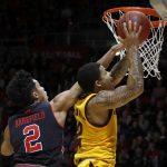 Arizona State's Rob Edwards, right, attempts a layup as Utah's Sedrick Barefield defends during the first half of an NCAA college basketball game Saturday, Feb. 16, 2019, in Salt Lake City. (AP Photo/Kim Raff)