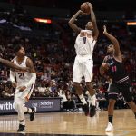 Phoenix Suns guard Jamal Crawford (11) shoots against Miami Heat guard Dion Waiters (11) during the first half of an NBA basketball game Monday, Feb. 25, 2019, in Miami. (AP Photo/Brynn Anderson)