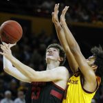 Stanford guard Cormac Ryan (23) drives past Arizona State guard Remy Martin during the first half of an NCAA college basketball game Wednesday, Feb. 20, 2019, in Tempe, Ariz. (AP Photo/Rick Scuteri)