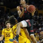 Arizona State forward Kimani Lawrence (14) draws the offensive foul on Stanford guard Bryce Wills during the first half of an NCAA college basketball game Wednesday, Feb. 20, 2019, in Tempe, Ariz. (AP Photo/Rick Scuteri)