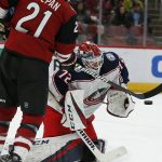 Columbus Blue Jackets goaltender Sergei Bobrovsky (72) makes the save in front of Arizona Coyotes center Derek Stepan in the second period during an NHL hockey game, Thursday, Feb. 7, 2019, in Glendale, Ariz. (AP Photo/Rick Scuteri)