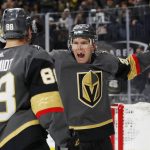 Vegas Golden Knights center Paul Stastny (26) celebrates after defenseman Nate Schmidt (88) scored against the Arizona Coyotes during the second period of an NHL hockey game Tuesday, Feb. 12, 2019, in Las Vegas. (AP Photo/John Locher)