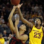 Stanford guard Marcus Sheffield shoots in front of Arizona State forward Romello White (23) during the first half of an NCAA college basketball game Wednesday, Feb. 20, 2019, in Tempe, Ariz. (AP Photo/Rick Scuteri)