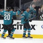 San Jose Sharks right wing Kevin Labanc (62) celebrates with teammate Marcus Sorensen (20) after scoring a goal against the Arizona Coyotes during the second period of an NHL hockey game in San Jose, Calif., Saturday, Feb. 2, 2019. (AP Photo/Tony Avelar)