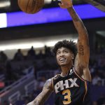 Phoenix Suns forward Kelly Oubre Jr. dunks against the Golden State Warriors during the second half of an NBA basketball game Friday, Feb. 8, 2019, in Phoenix. The Warriors won 117-107. (AP Photo/Ross D. Franklin)