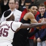 Colorado guard Tyler Bey, right, gets trapped with the ball by Arizona State forward Zylan Cheatham in the first half of an NCAA college basketball game Wednesday, Feb. 13, 2019, in Boulder, Colo. (AP Photo/David Zalubowski)