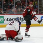 Columbus Blue Jackets goaltender Sergei Bobrovsky makes the save in front of Arizona Coyotes center Nick Cousins (25) in the second period during an NHL hockey game, Thursday, Feb. 7, 2019, in Glendale, Ariz. (AP Photo/Rick Scuteri)