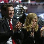 The Arizona Coyotes team honors Shane Doan, left, with his wife Andrea, during a jersey retirement ceremony prior to an NHL hockey game against the Winnipeg Jets Sunday, Feb. 24, 2019, in Glendale, Ariz. (AP Photo/Ross D. Franklin)