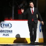 Former Arizona Coyotes hockey captain Shane Doan waves to fans as he arrives during his jersey retirement ceremony prior to an NHL hockey game against theWinnipeg Jets Sunday, Feb. 24, 2019, in Glendale, Ariz. (AP Photo/Ross D. Franklin)