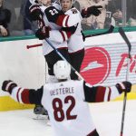 Arizona Coyotes defenseman Oliver Ekman-Larsson (23) celebrates his goal with teammates Nick Cousins (25) and Jordan Oesterle (82) during the first period of an NHL hockey game against the Dallas Stars in Dallas, Monday, Feb. 4, 2019. (AP Photo/LM Otero)