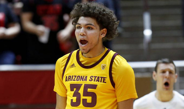 Arizona State's Taeshon Cherry celebrates his team's lead in the first half of an NCAA college bask...